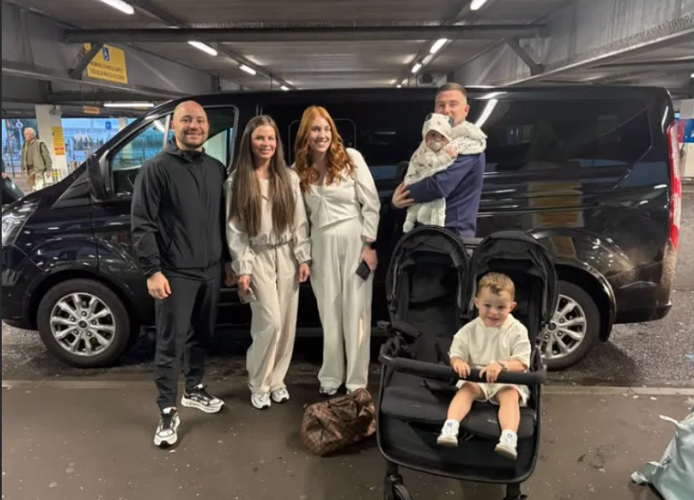 Family ready for their Florida holiday beside the minibus